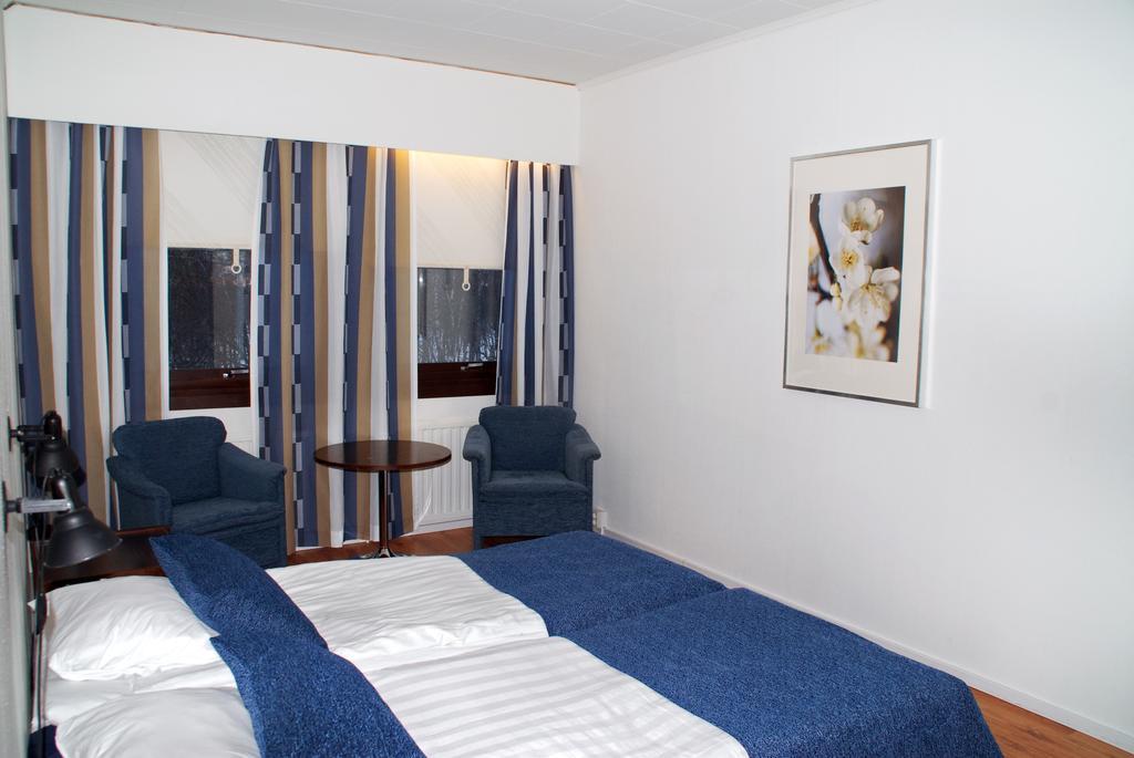 Eckeroe Hotell & Restaurang Pokoj fotografie